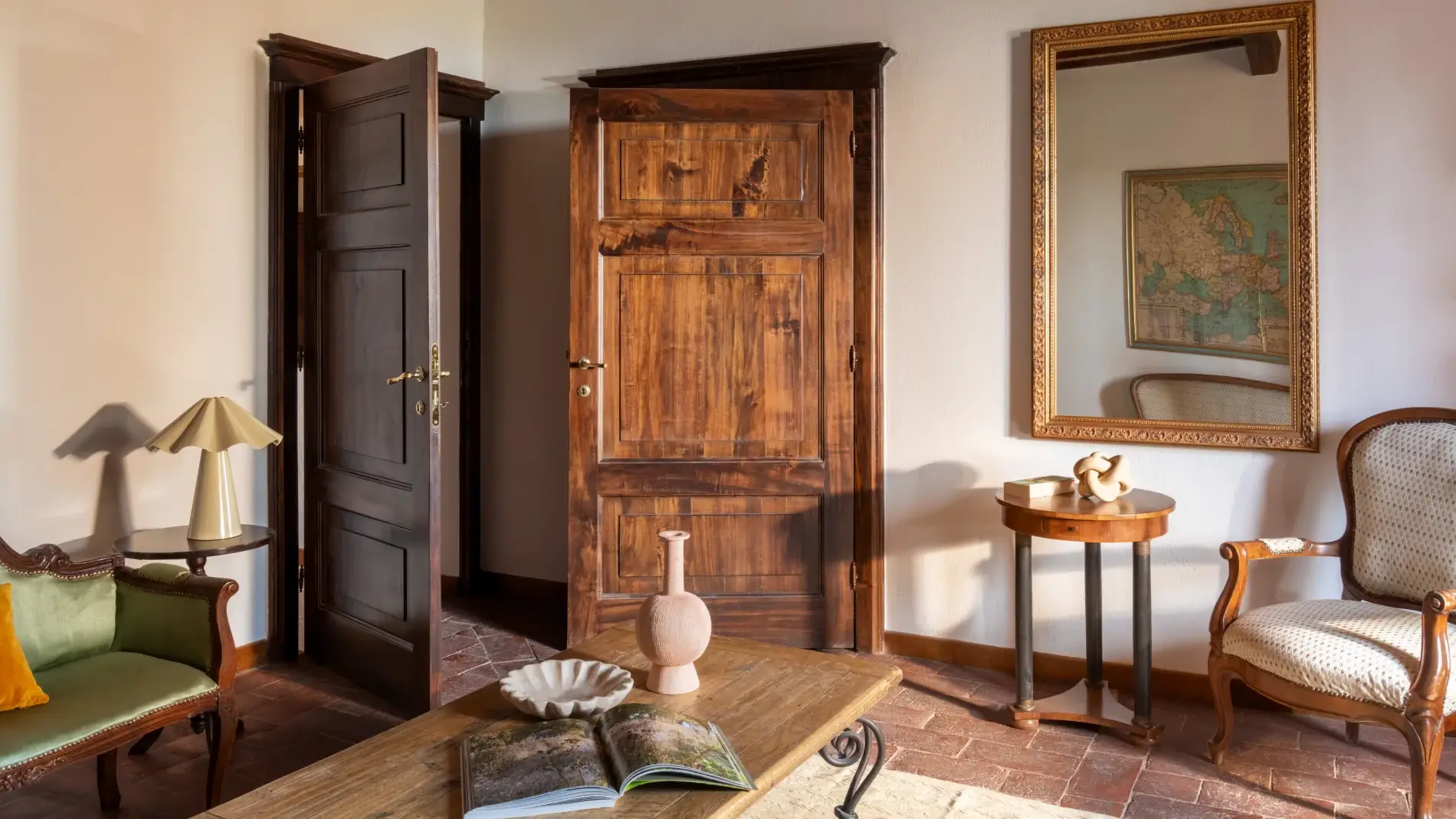 Sitting area with wooden doors and classic furnishings - Villa San Bartolomeo, BZAR hotels in Tuscany